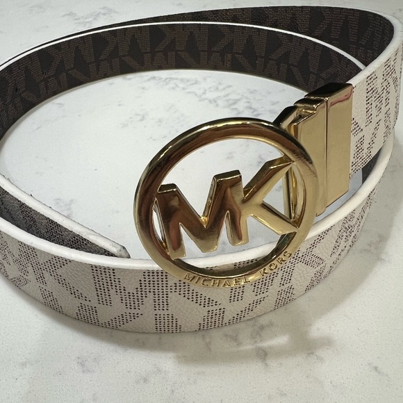 Michael Kors Accessories - Michael Kors Gold Logo White Belt New without tags!!